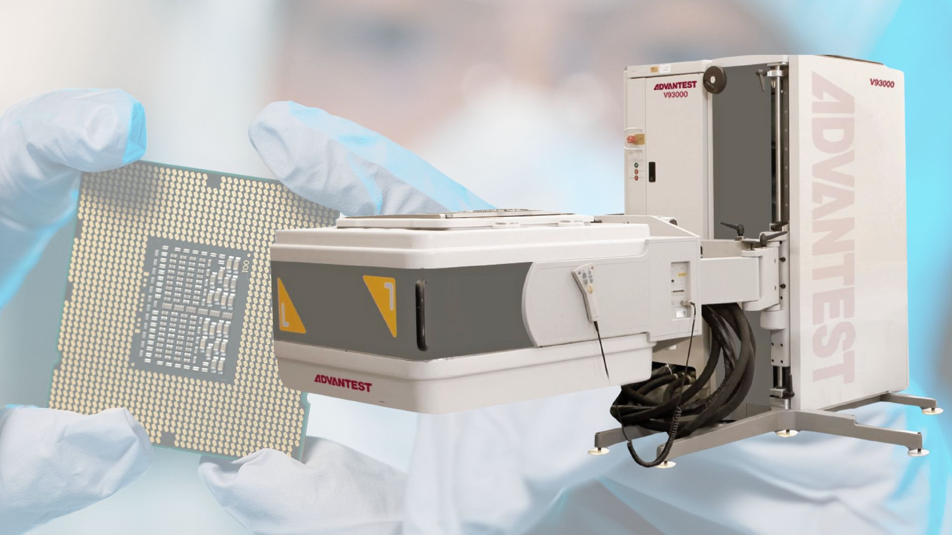 Advantest V93000 SoC test system beside a gloved hand holding a processor, illustrating semiconductor cooling reliability.
